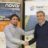 Two men shake hands to celebrate a new partnership between Transi'sun and Novar.