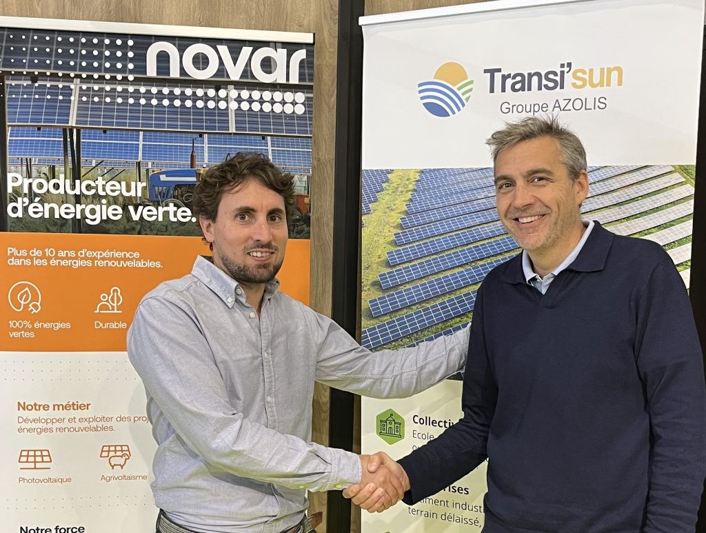 Two men shake hands to celebrate a new partnership between Transi'sun and Novar.
